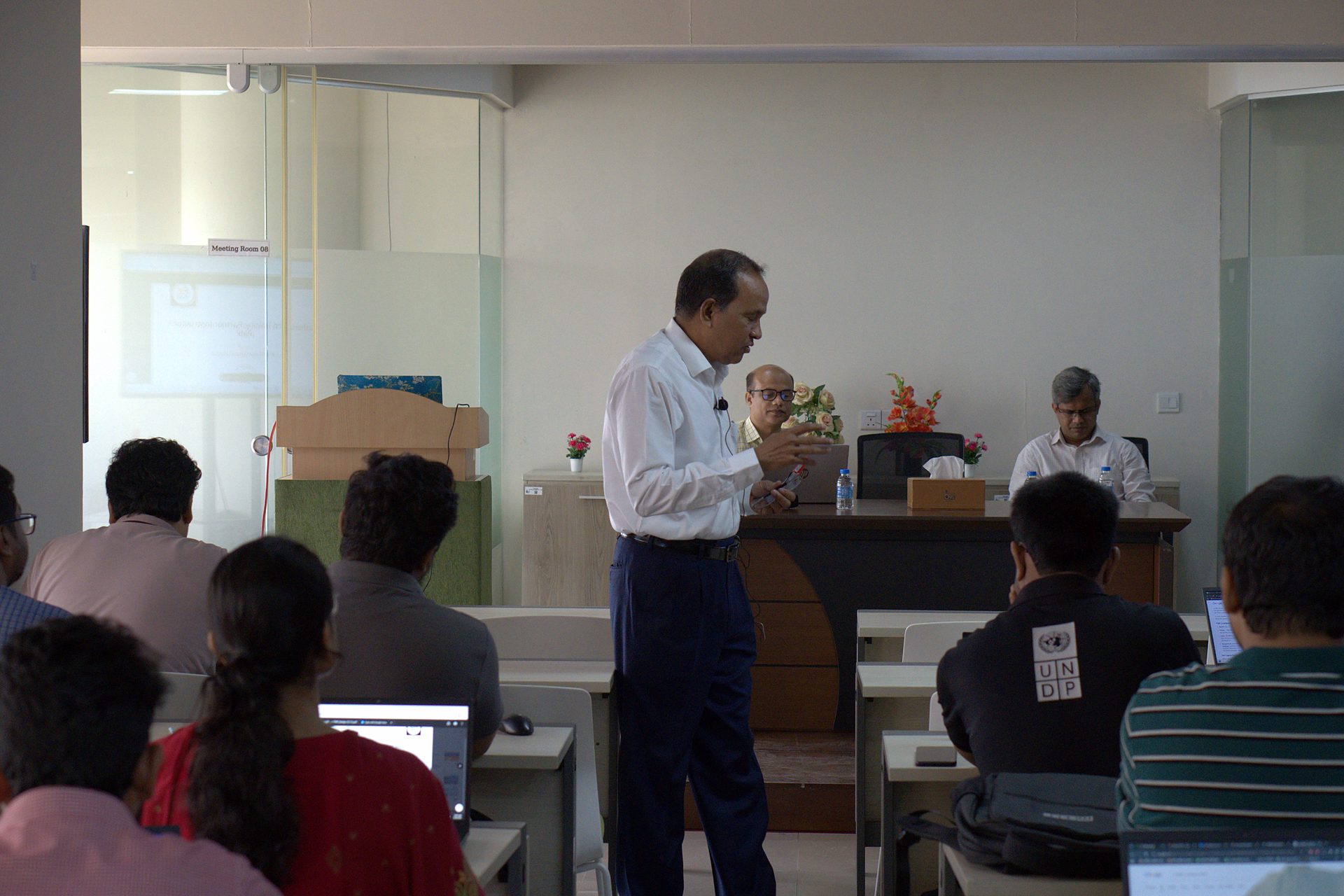 Trainer at the front of the room