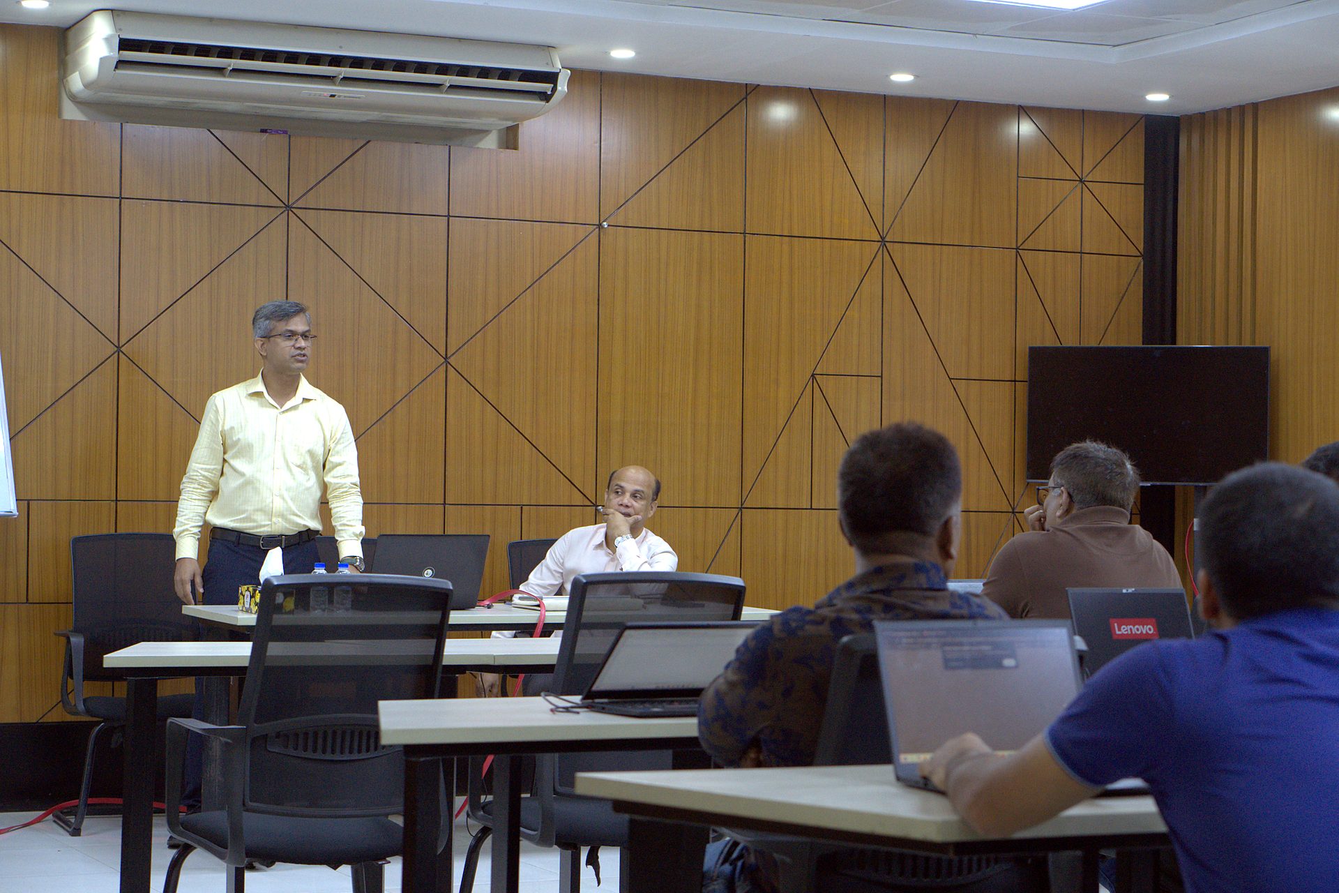 Wide view of the a2i conference room on Day 2