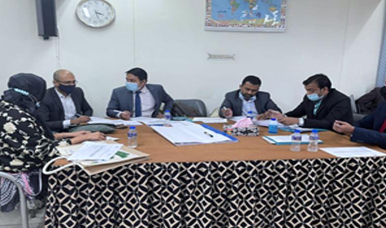Participants engaged in a group discussion on sustainable finance
