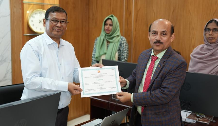 A participant receiving a certificate from the Secretary