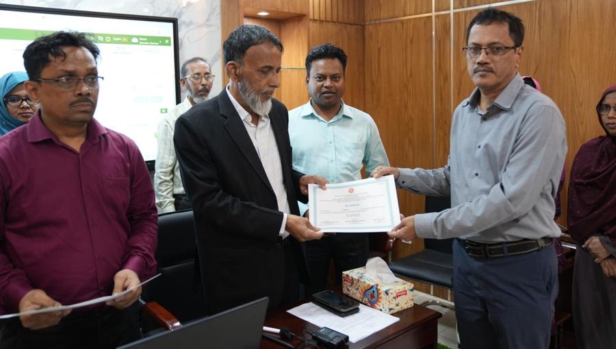 A participant receiving a certificate from the Secretary