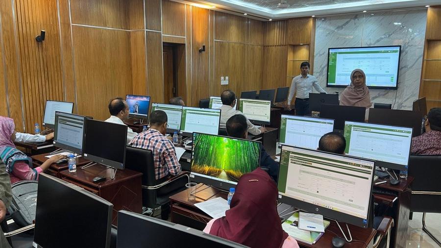 Participants in a hands-on session on the e-PMIS application