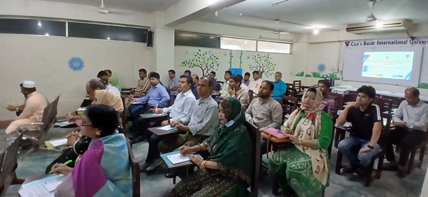 Participants engaged in an academic session