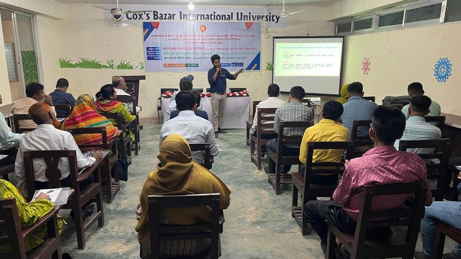 Participants engaged in an academic session on project evaluation