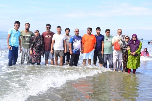 Participants enjoying a recreational visit to the Cox's Bazar sea beach