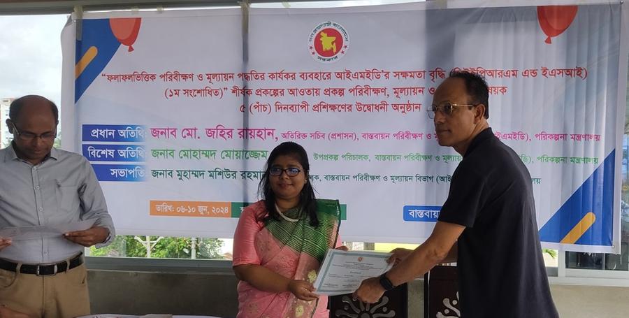 A participant receiving a certificate of completion
