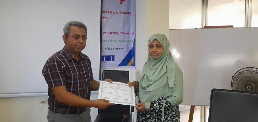 A participant receiving a certificate of completion