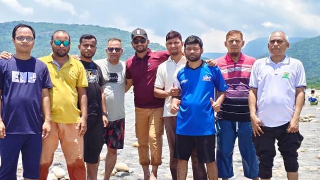 Participants enjoying an educational field visit to a scenic location in Sylhet