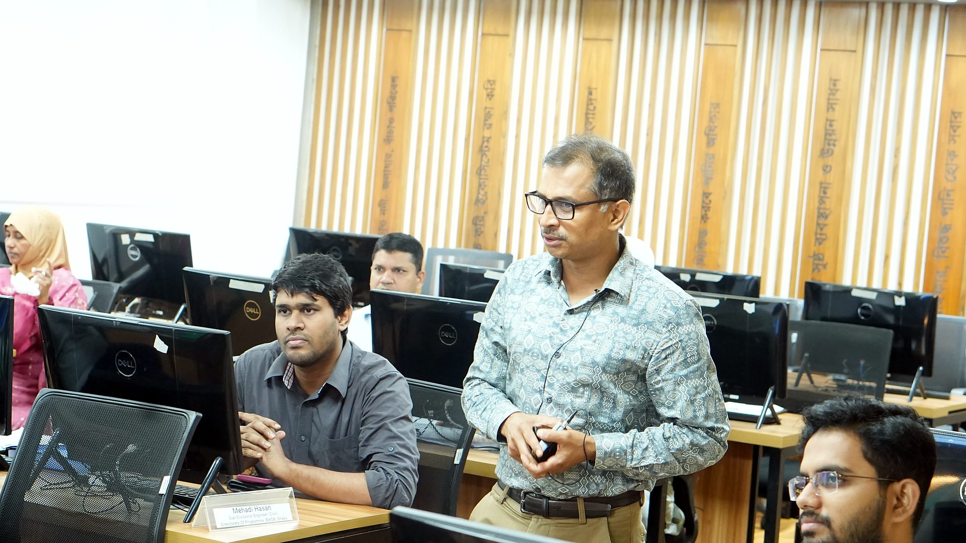 Participants following a session on financial management at the Central ICT Lab