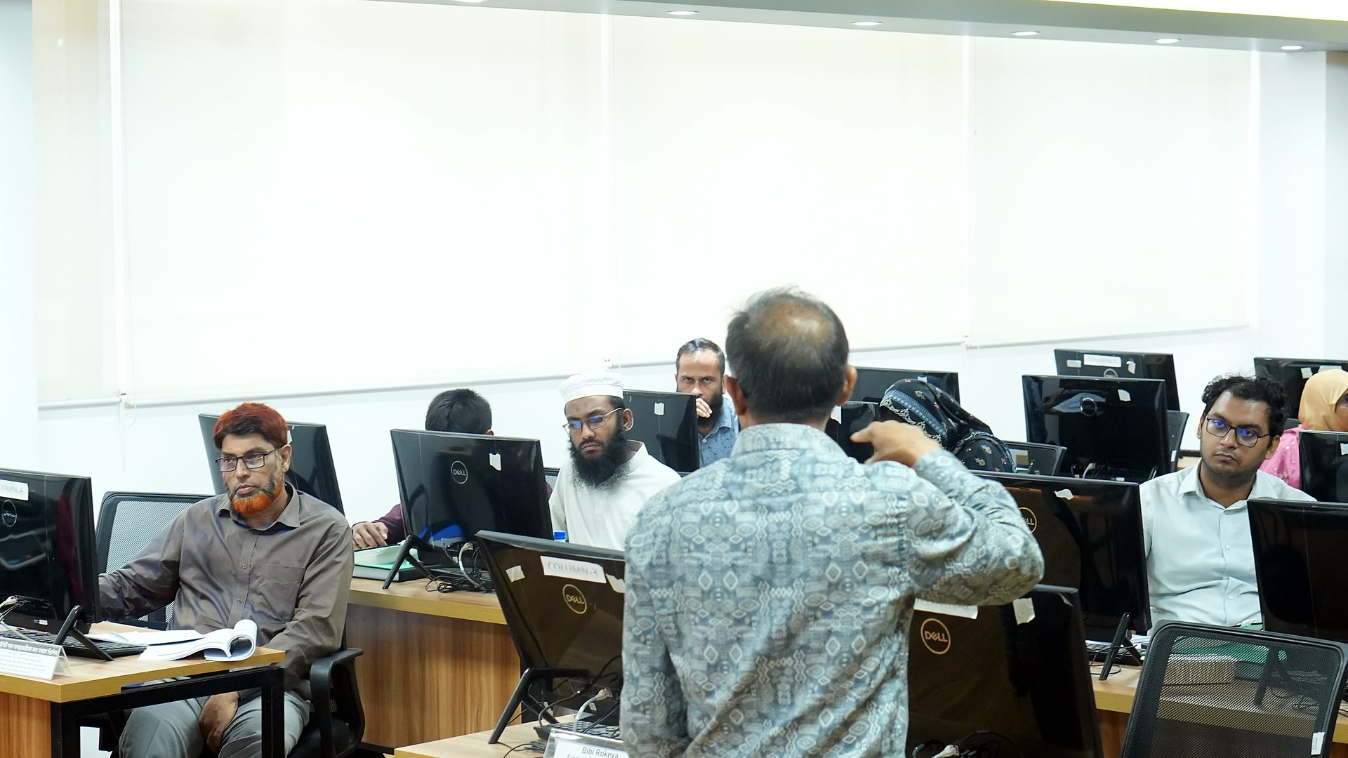 Participants during an accounting session at their workstations