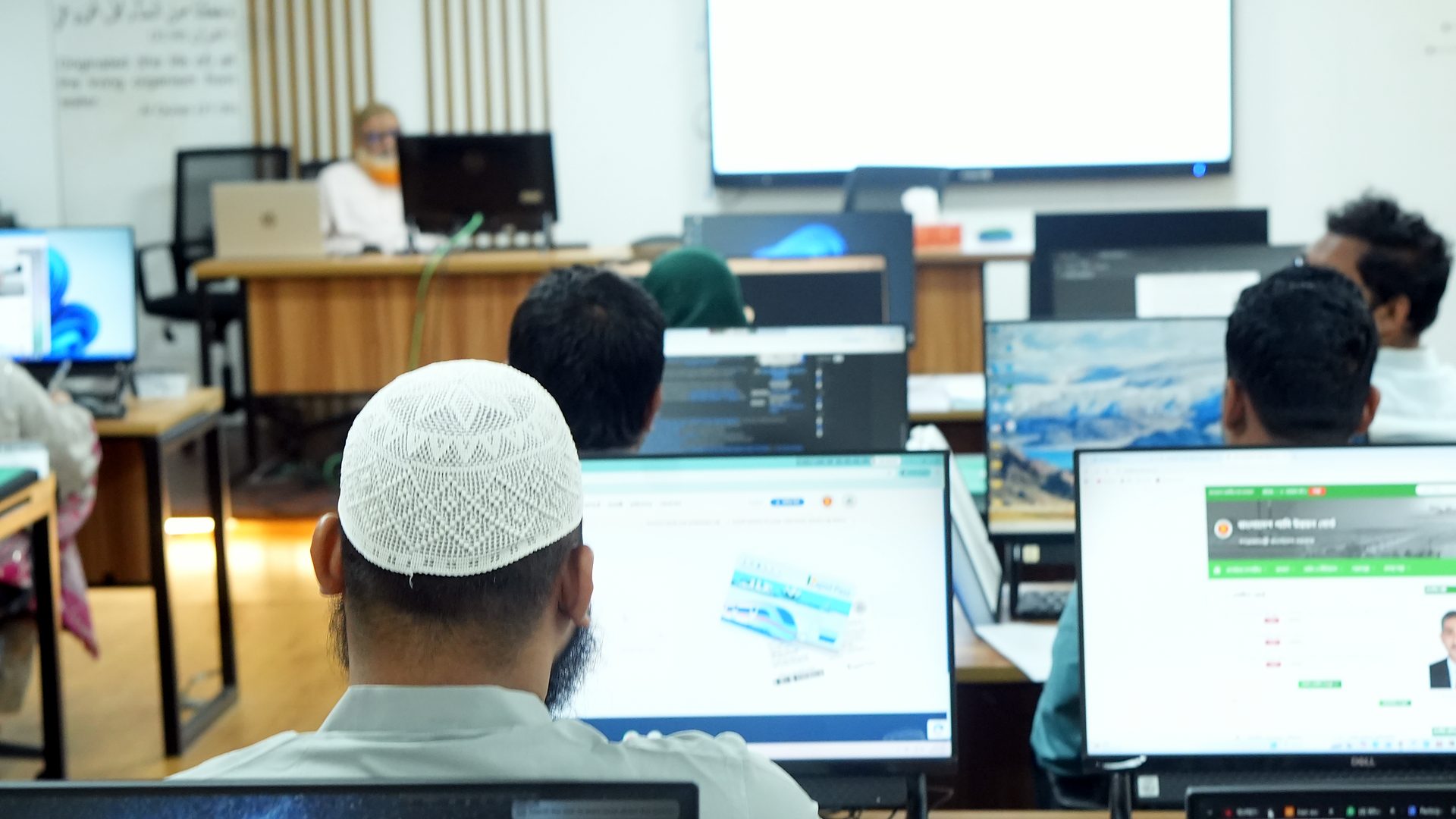 Participants following a presentation