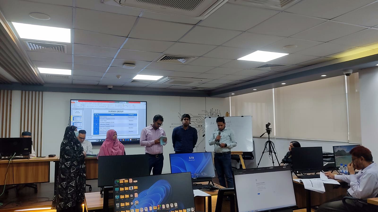 The Surma participant group presenting its group work to the class