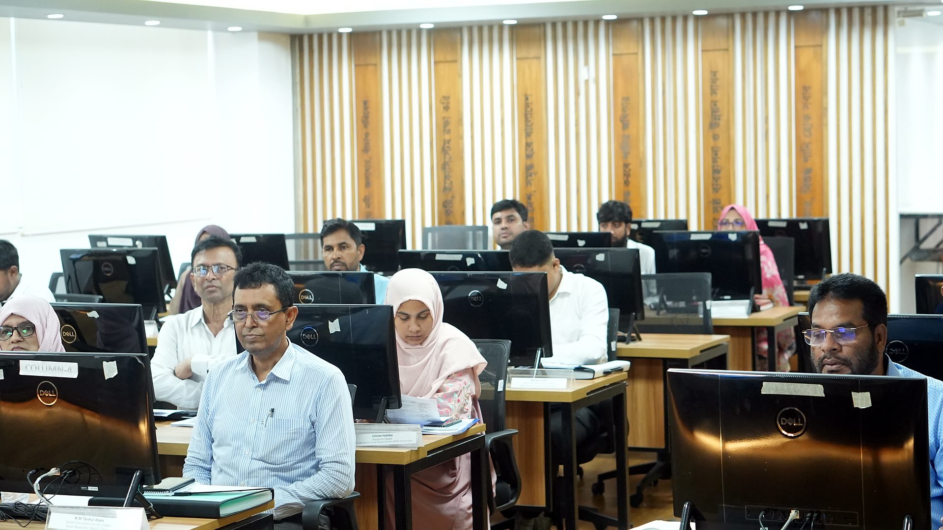 Participants at their workstations on the opening morning