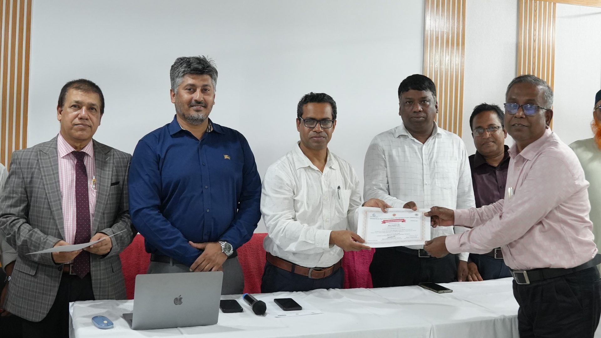 Second certificate handover photograph at the IWRM training closing ceremony
