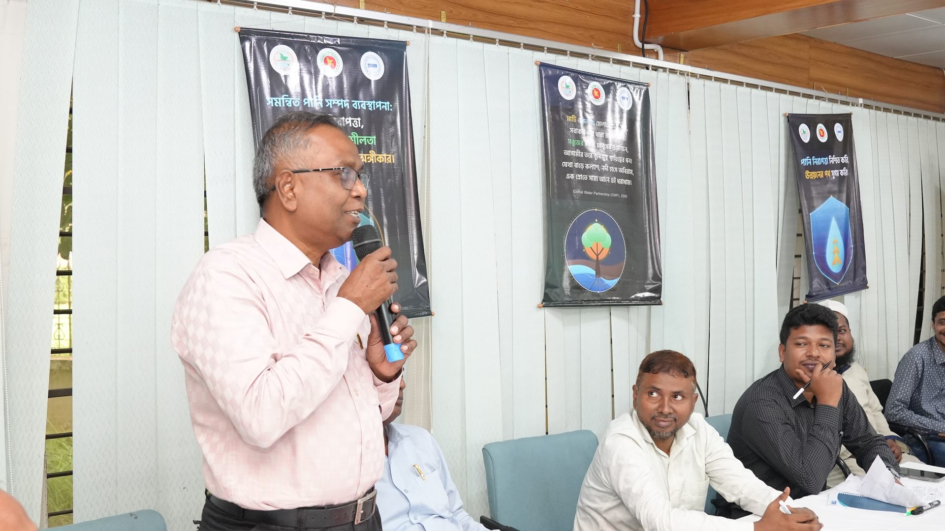 Participants delivering closing remarks on the final day of the IWRM training
