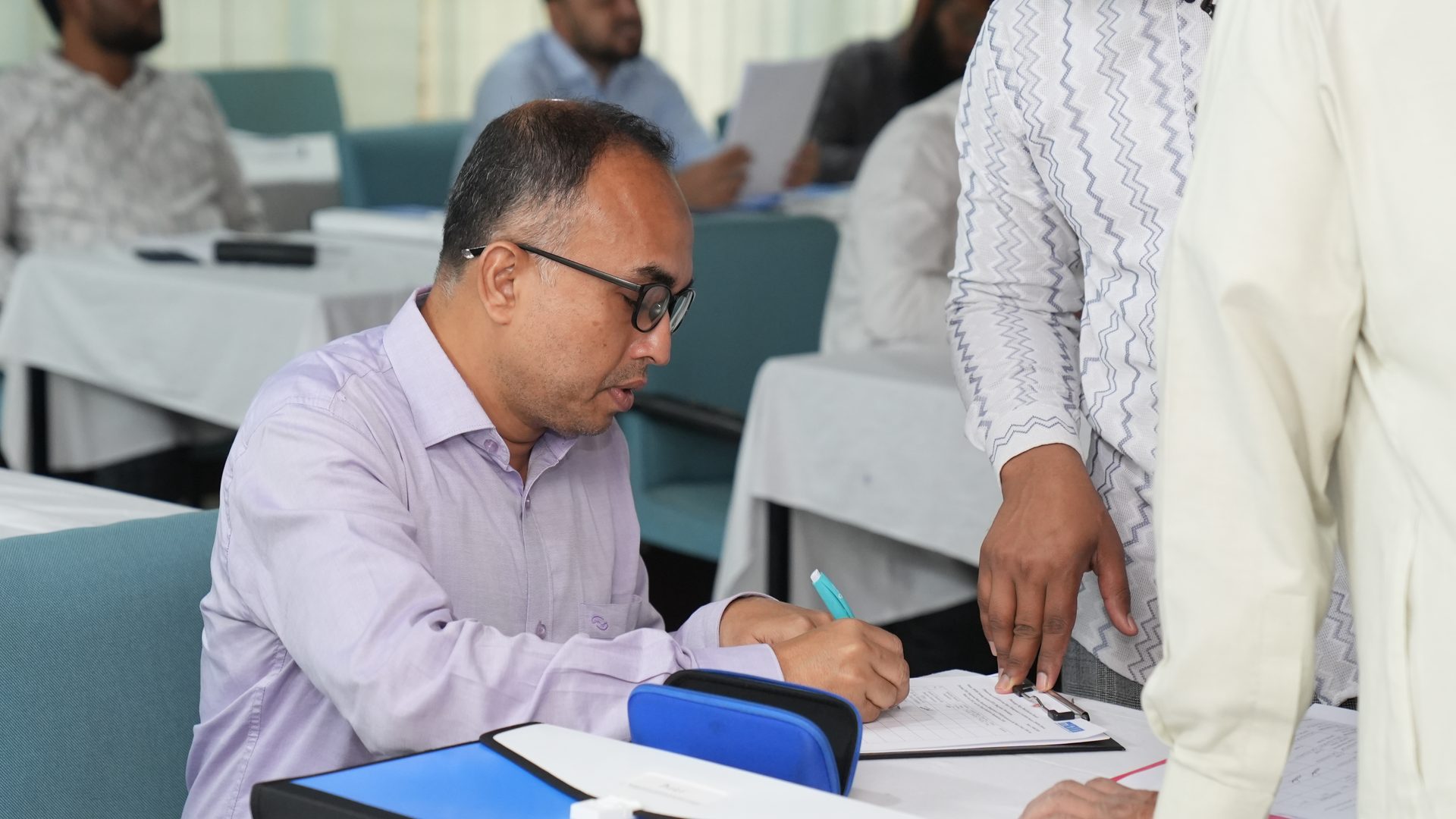 Participants registering for the IWRM training course