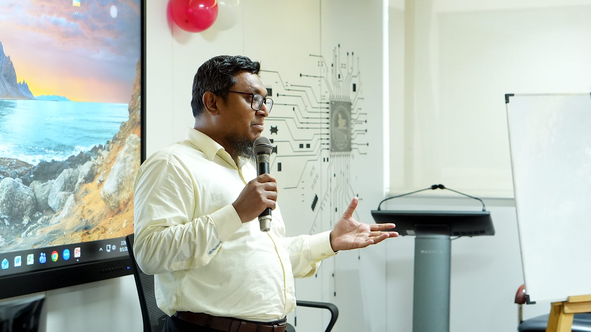 Resource person speaking to participants