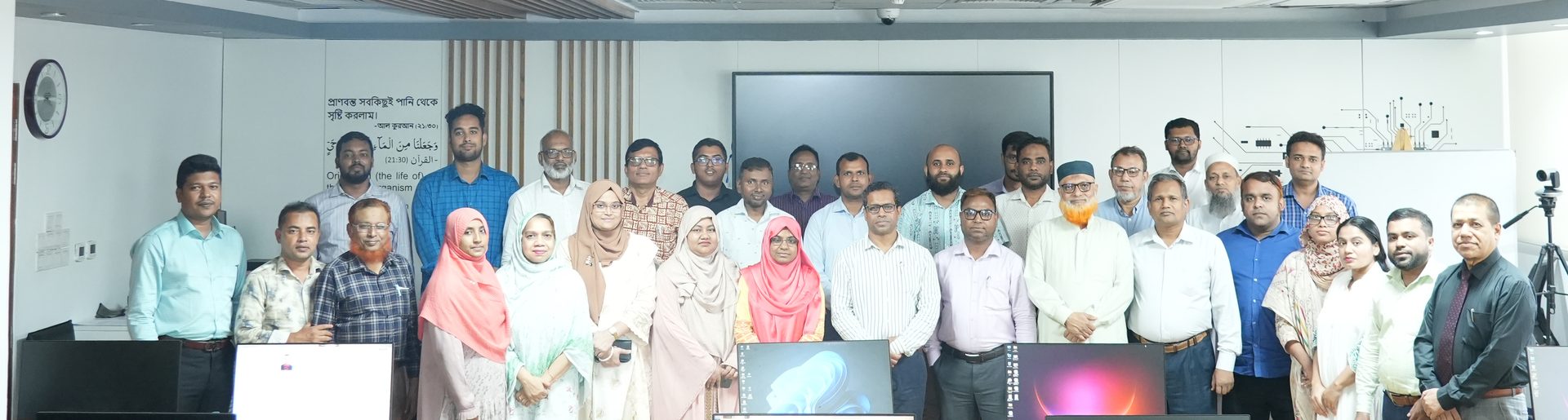 Panoramic group photograph of 25 BWDB officials and course management at the Participatory Water Management Rules 2014 training, Central ICT Lab, Pani Bhaban, Dhaka
