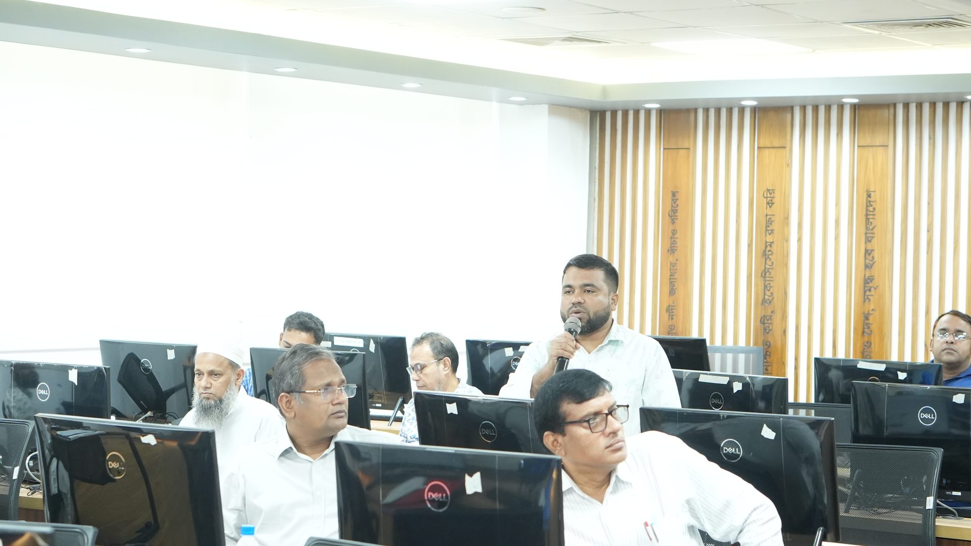 Participants introducing themselves at the opening session of the training