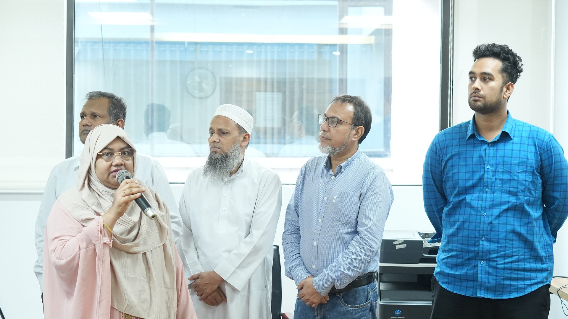 Second participant group presenting key learnings from the training