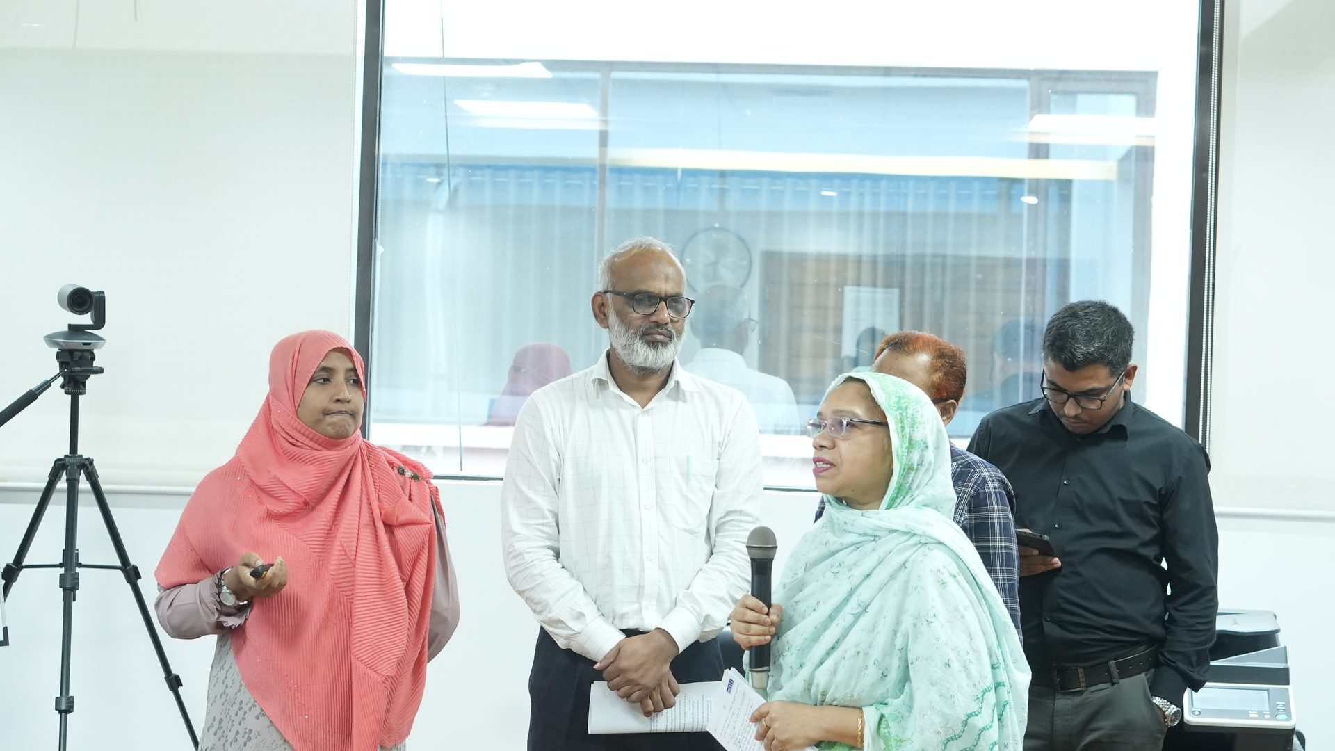 Participants presenting their group synthesis to the Project Director
