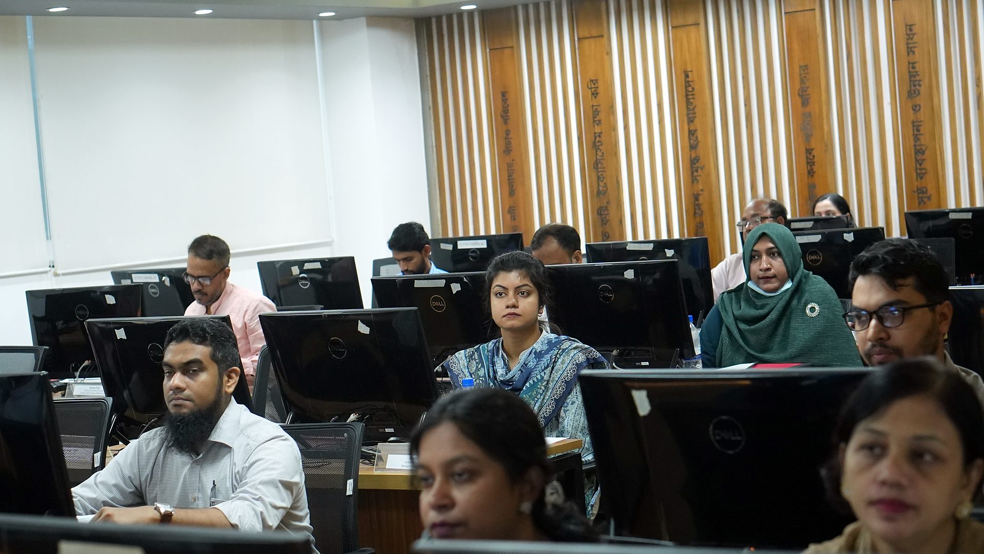 Participants at their workstations during a session