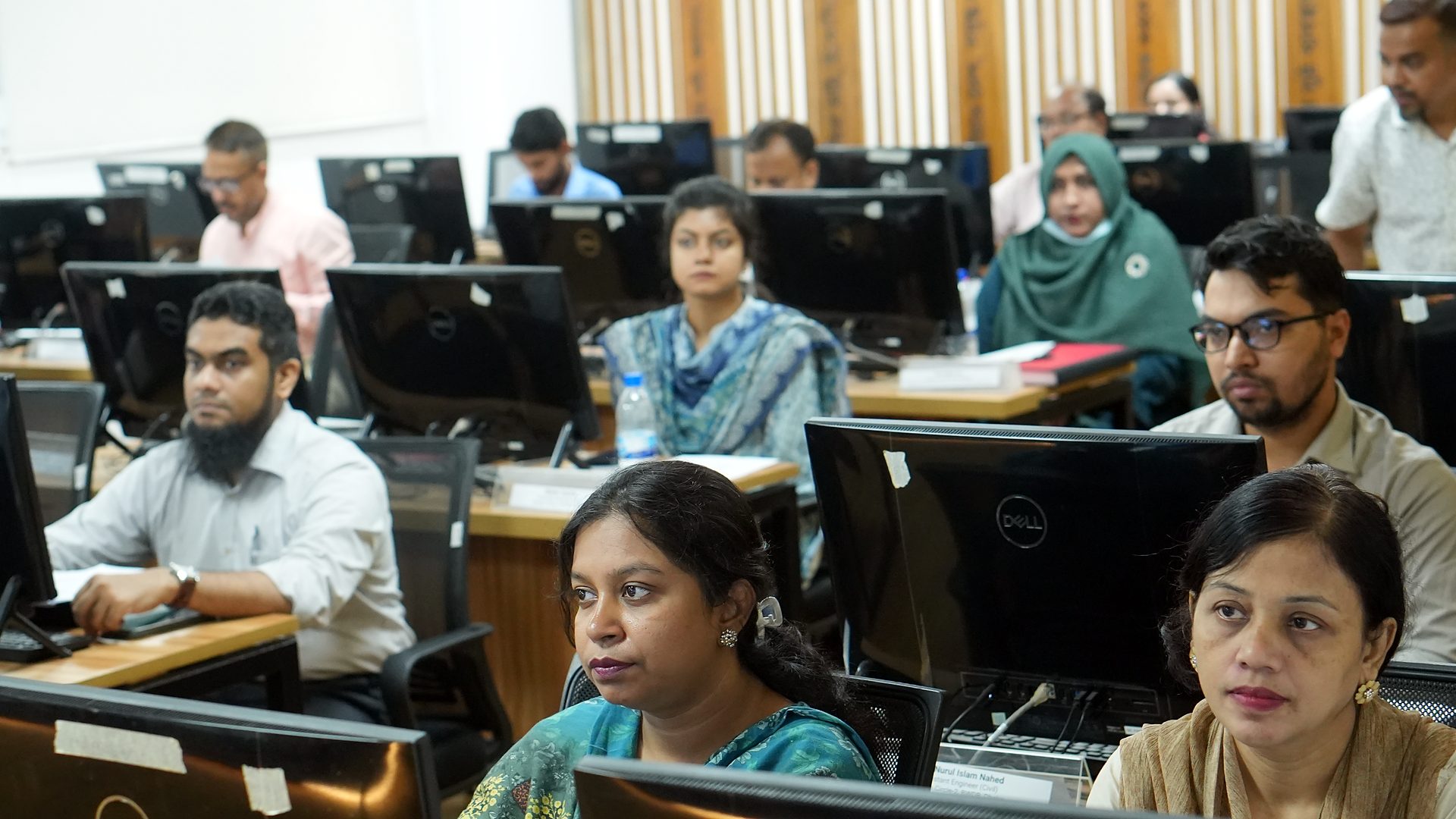 Participants following a presentation