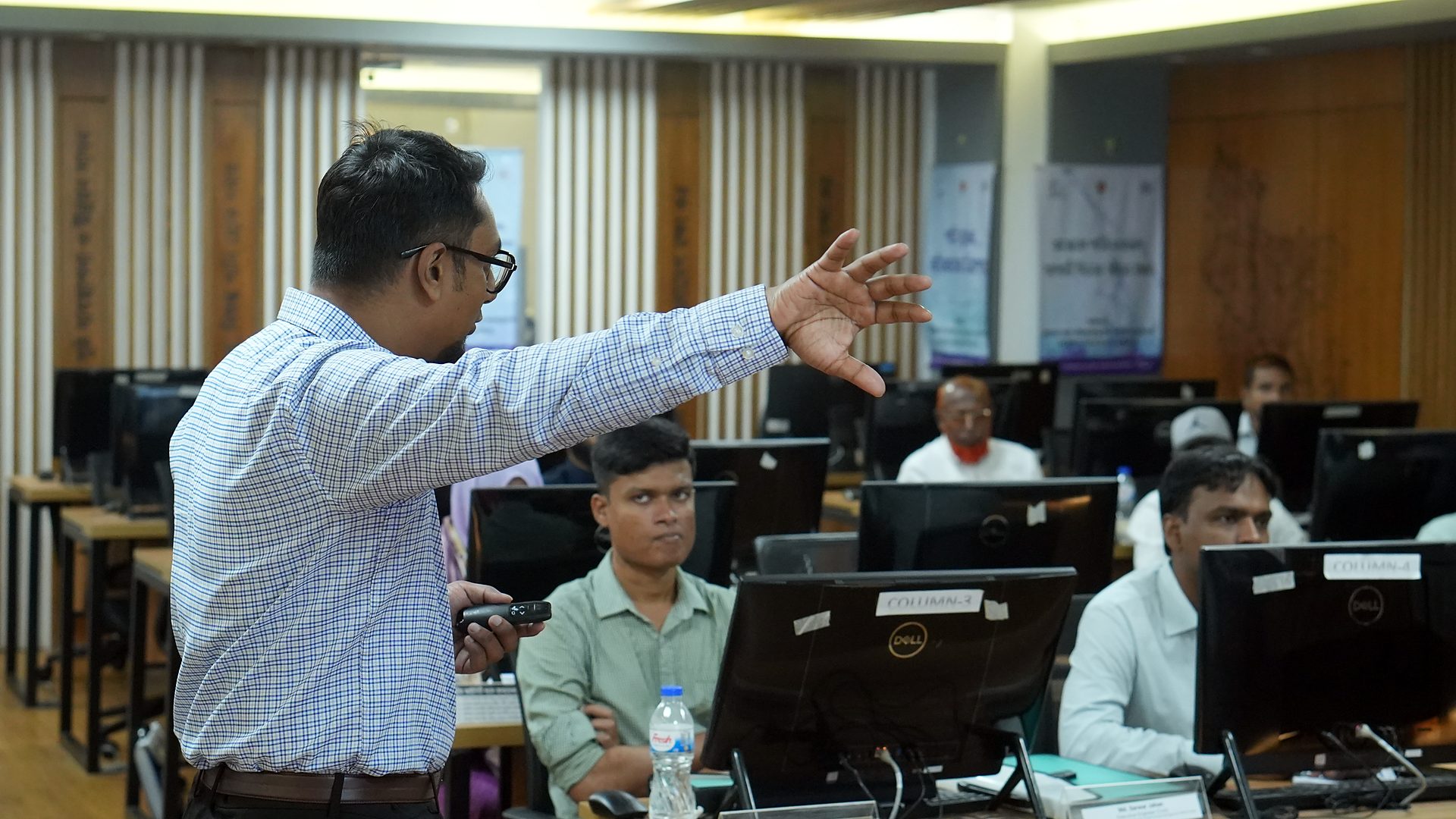 Resource person gesturing during an explanation