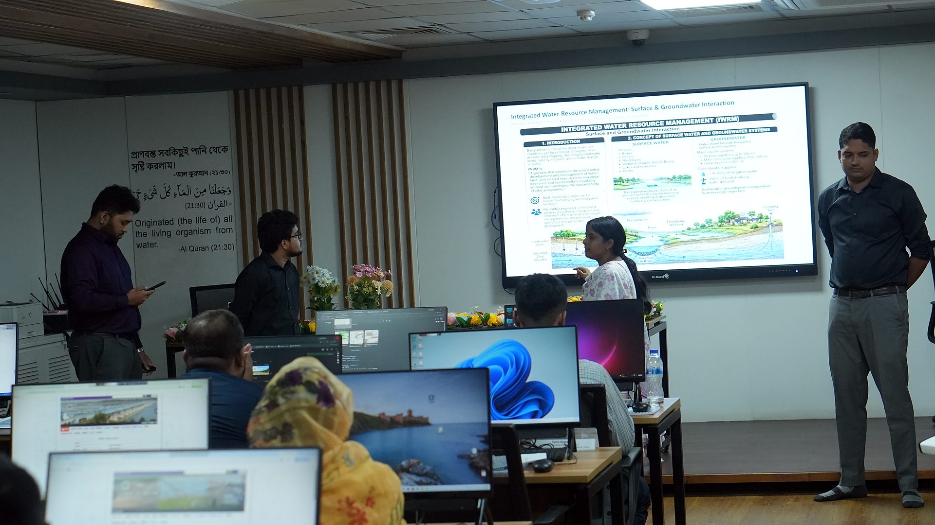 Team presenting a slide with river diagrams