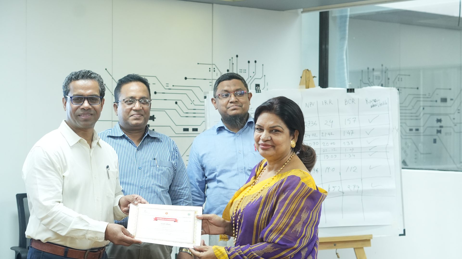 Certificate handover near the close of the ceremony