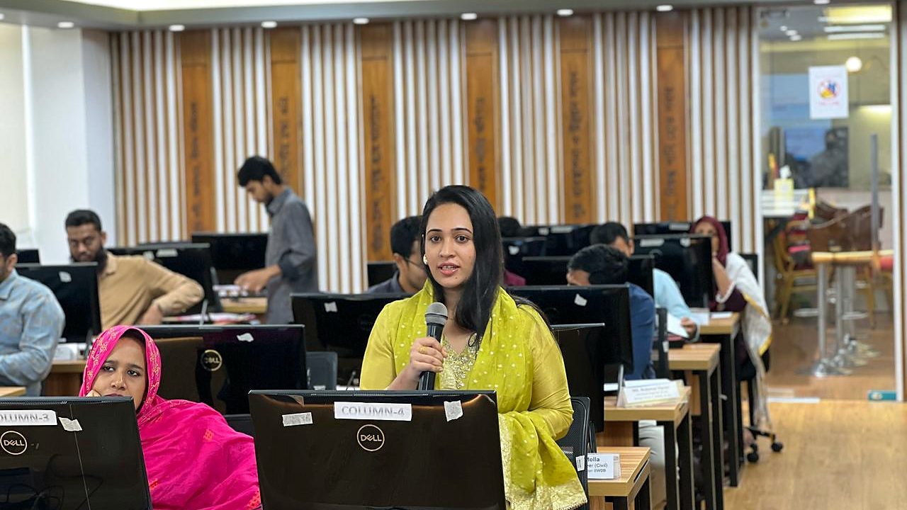 Participant speaking with a microphone