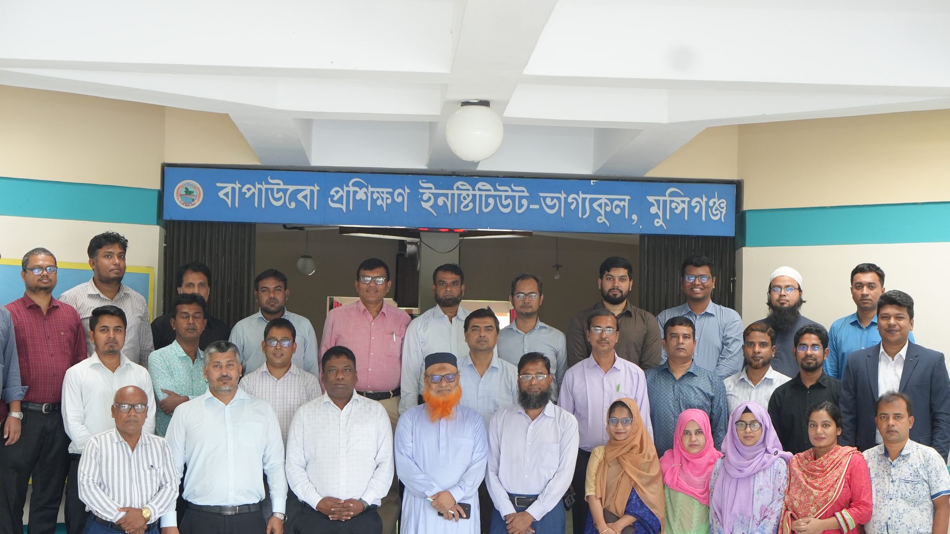 Group photograph of 25 BWDB officials and course management in front of the BWDB Training Institute, Bhagyakul, Munshiganj