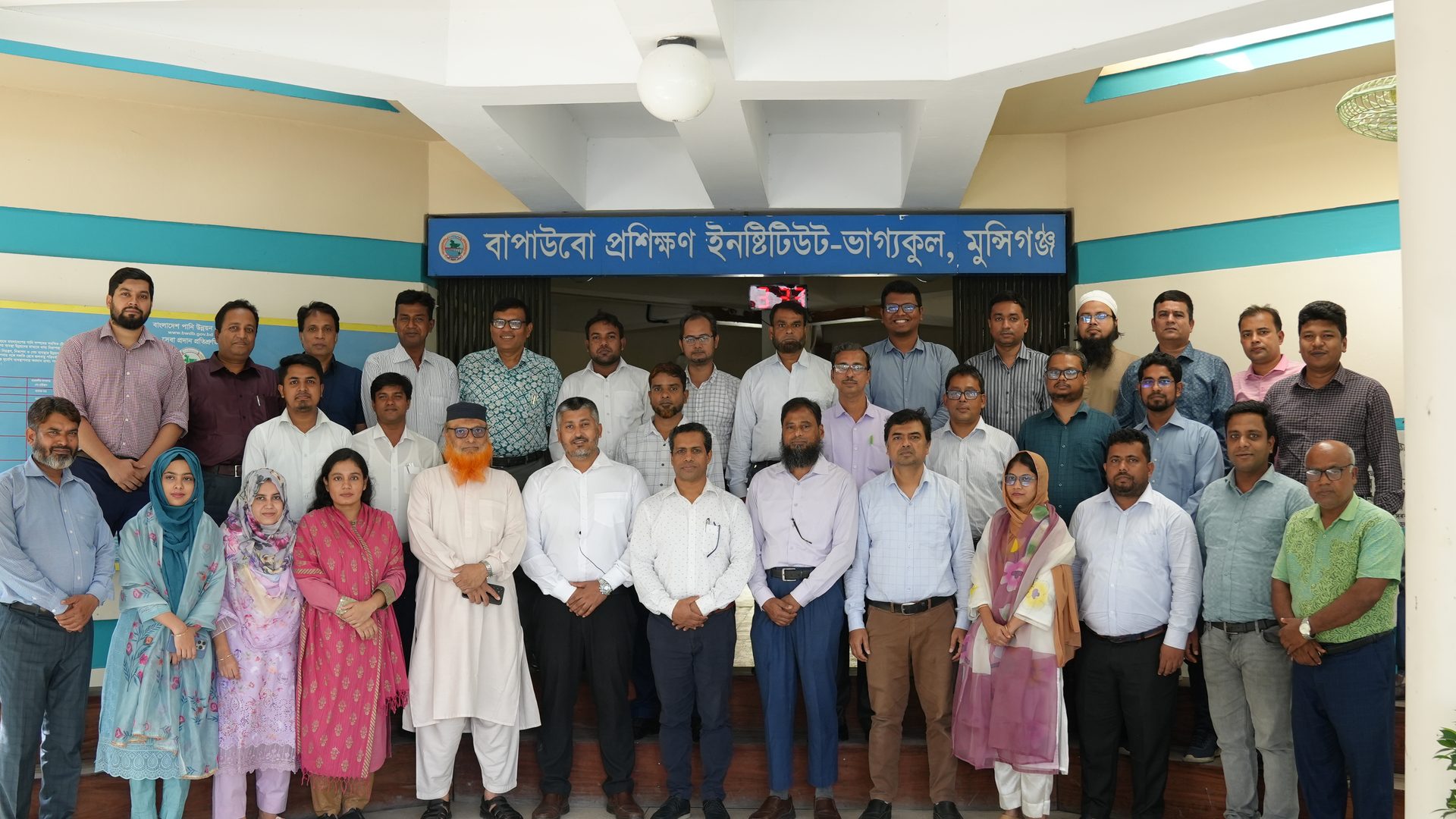 Group photograph of the Package 22 Batch 1 cohort at the close of the course