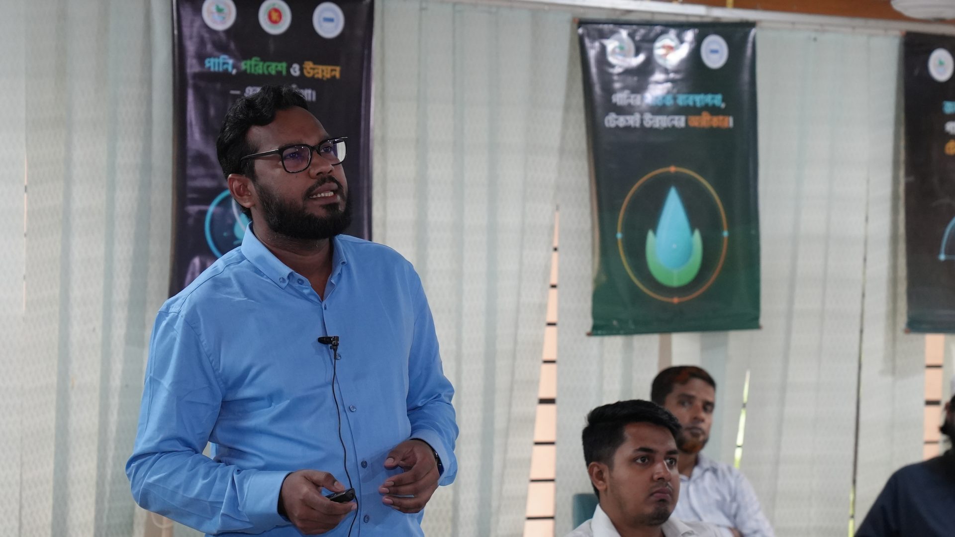 A participant giving verbal feedback during the training