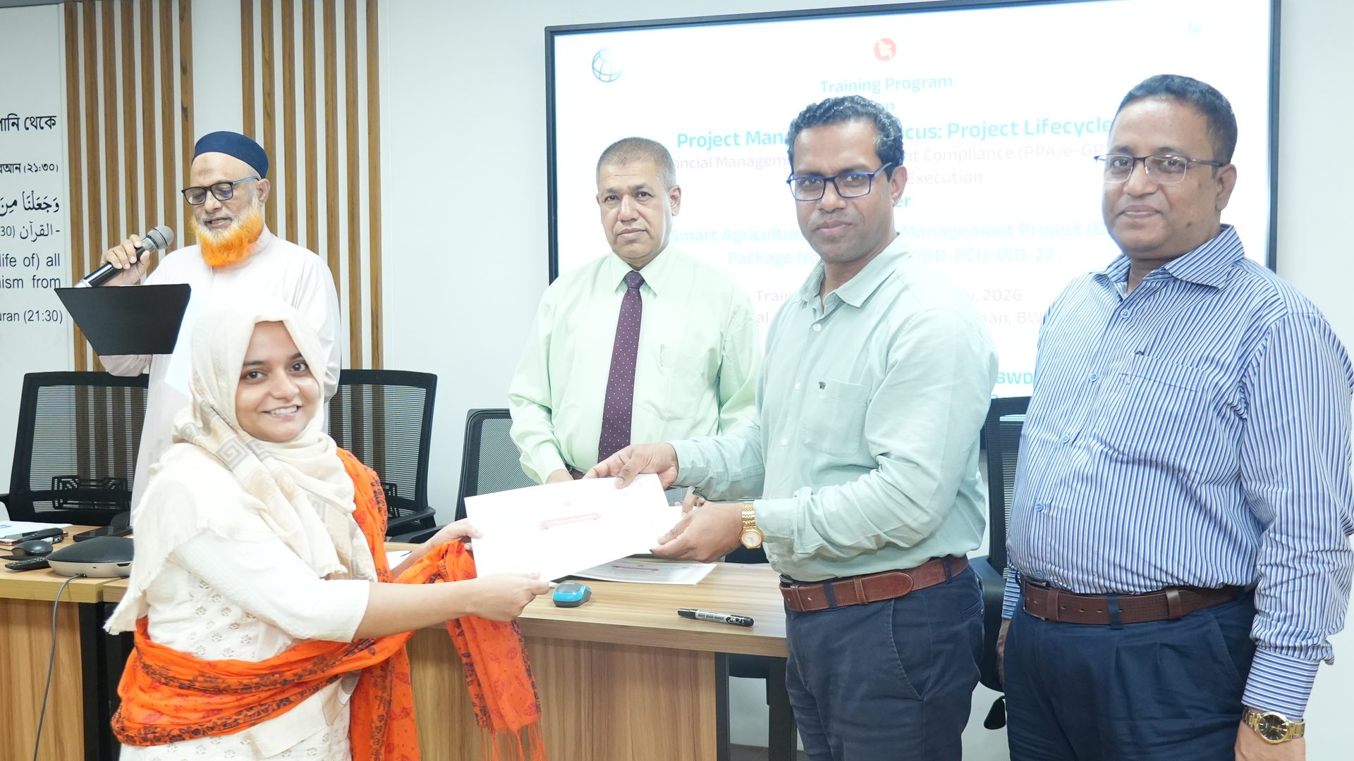 A second certificate handover at the closing ceremony