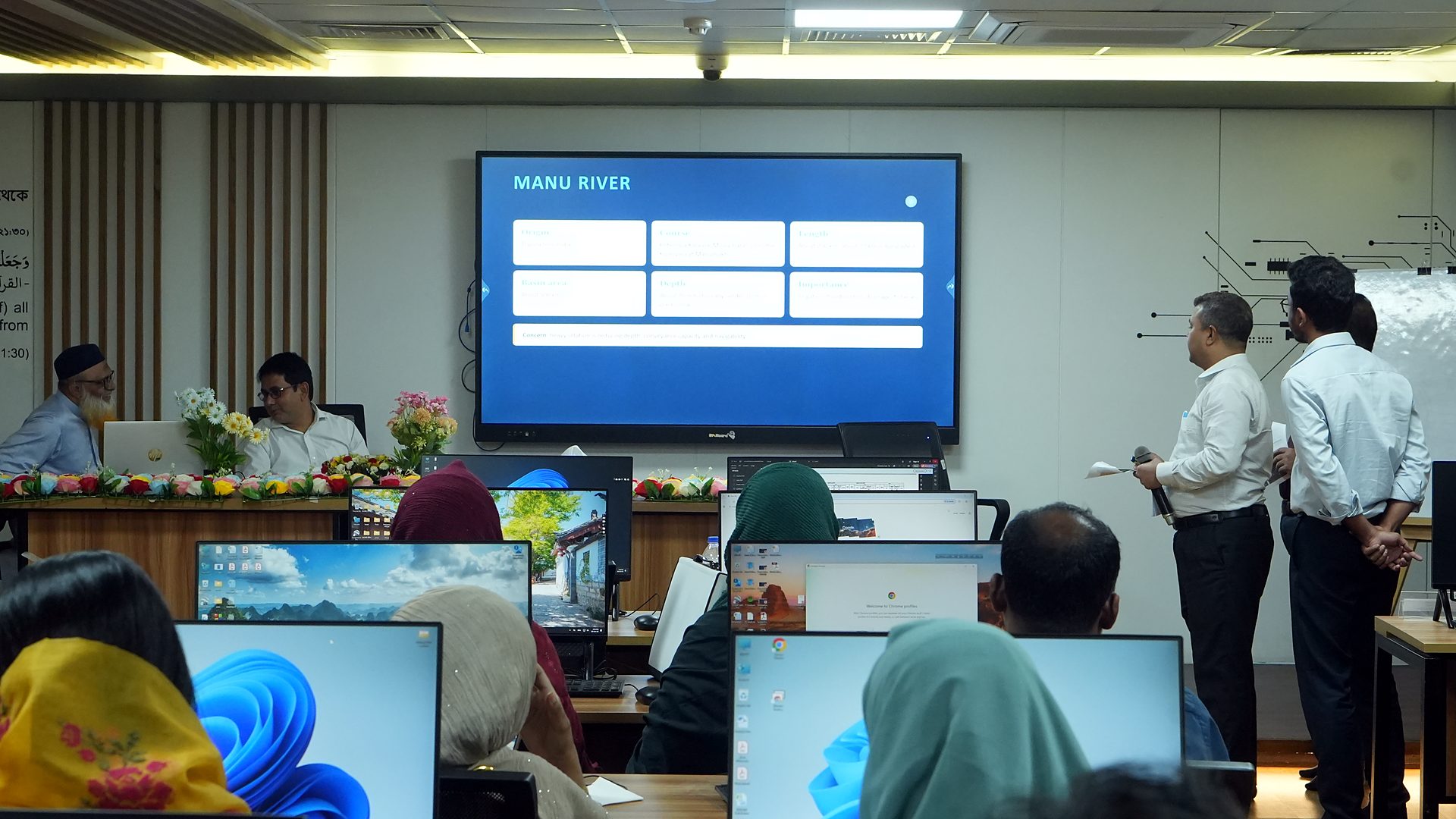 Manu River slide on screen during a presentation