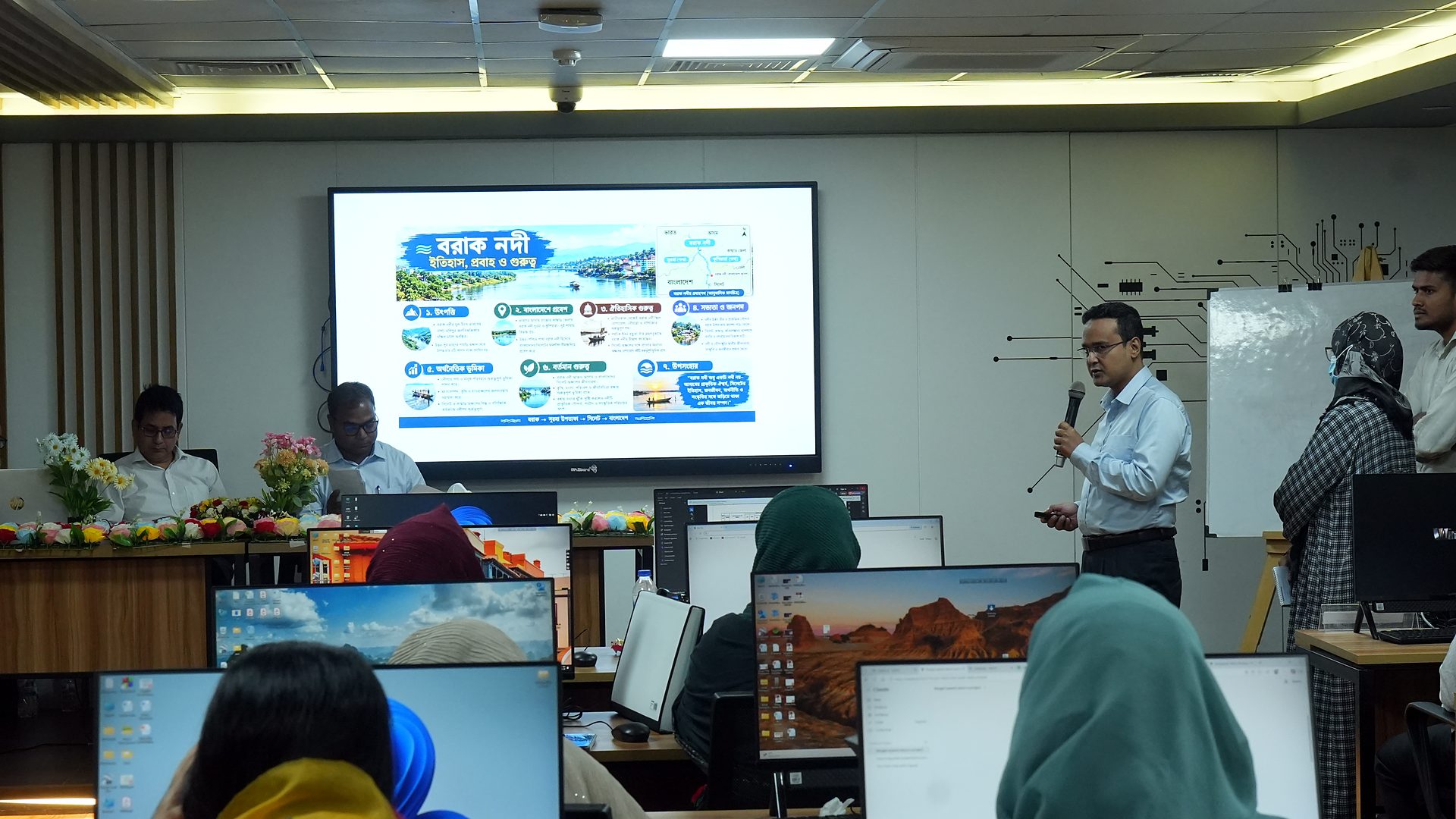 Team presenting a Bangla project slide