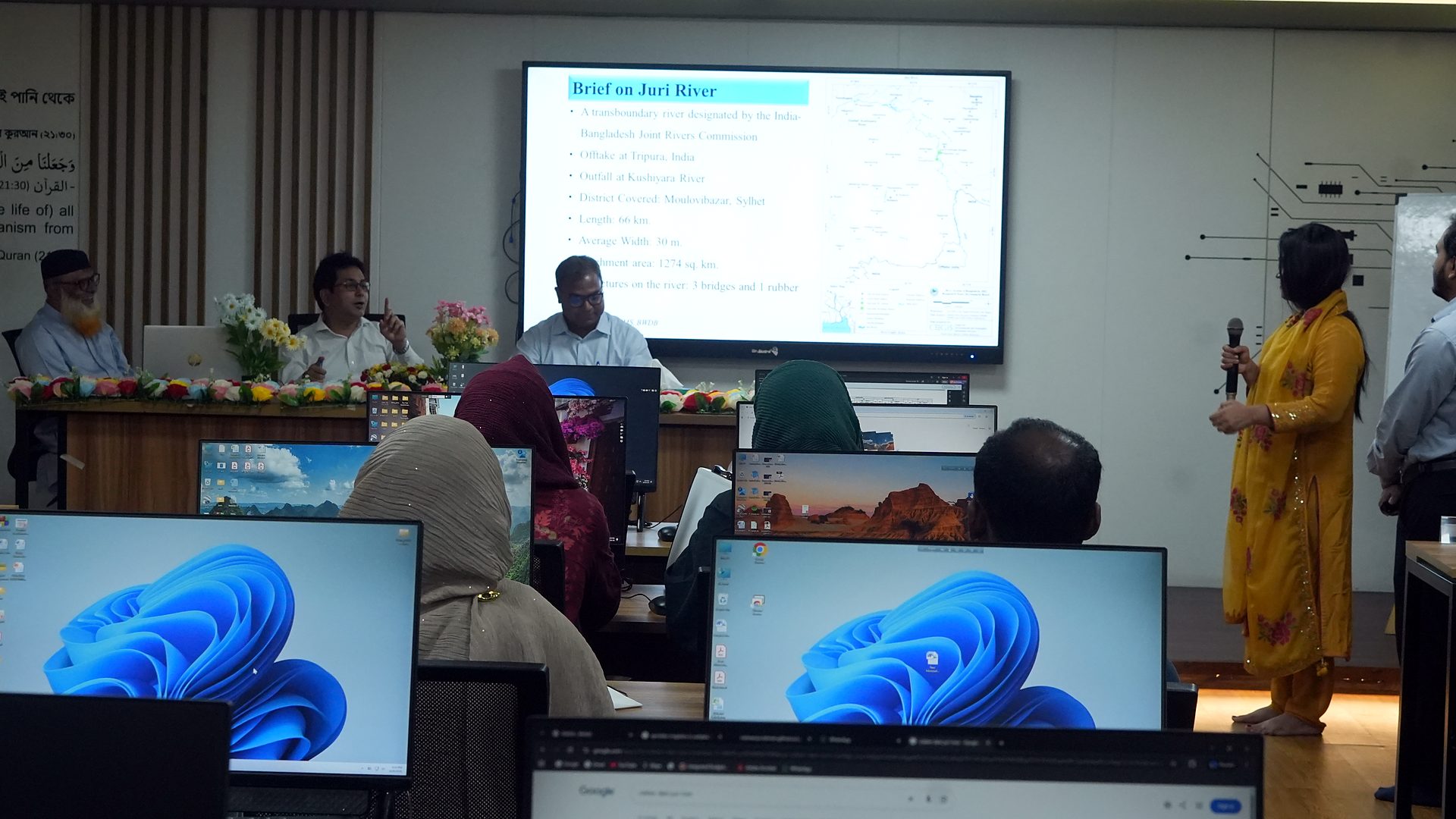 Team presenting a brief on the Juri River