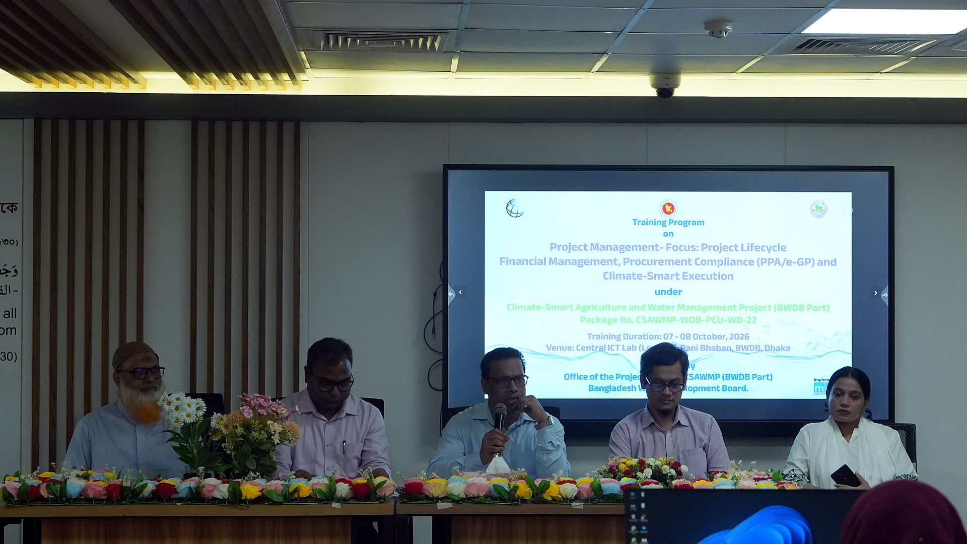 Opening session at the dais under the Project Management training banner