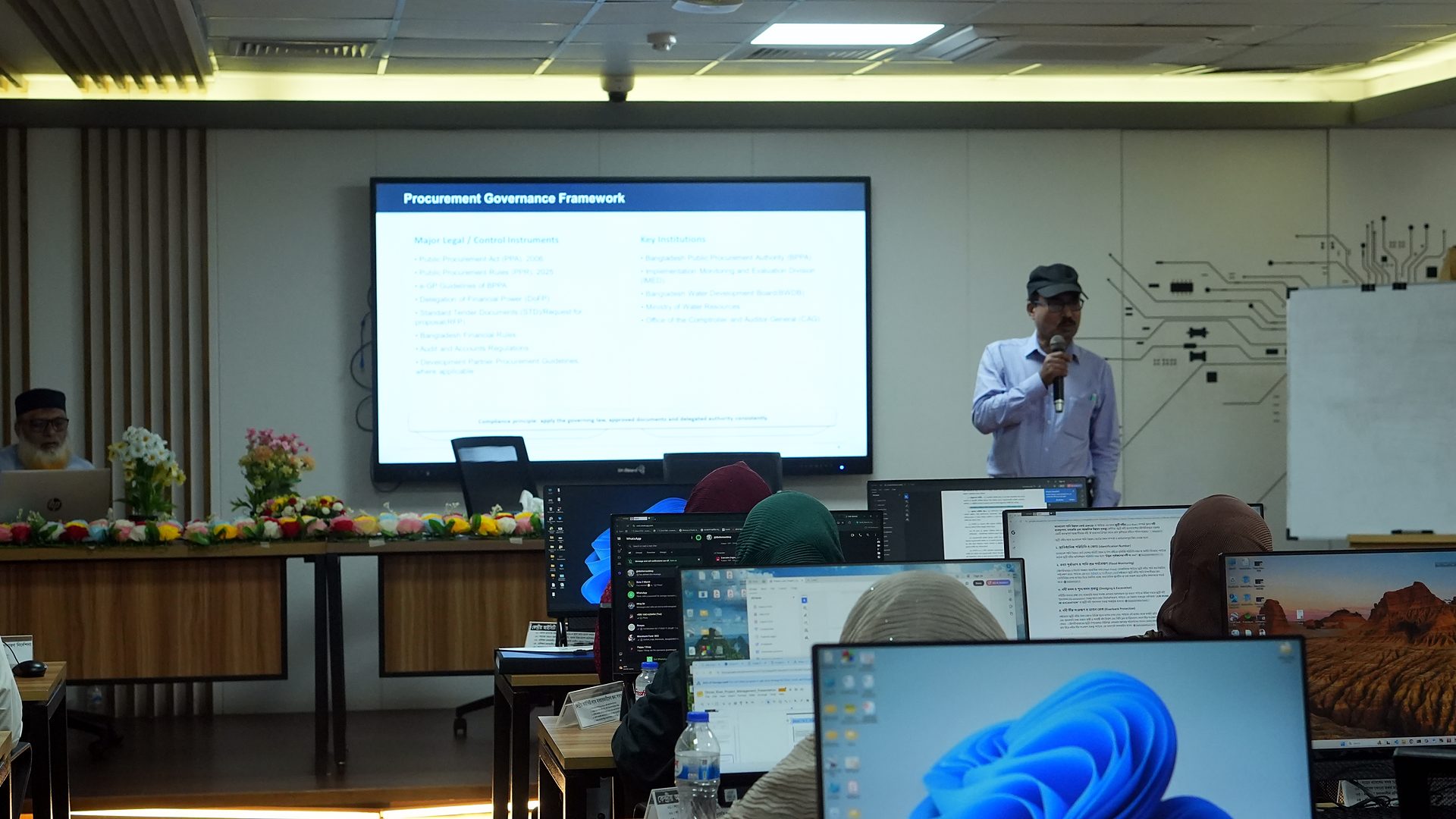 Procurement governance framework slide on the lab screen