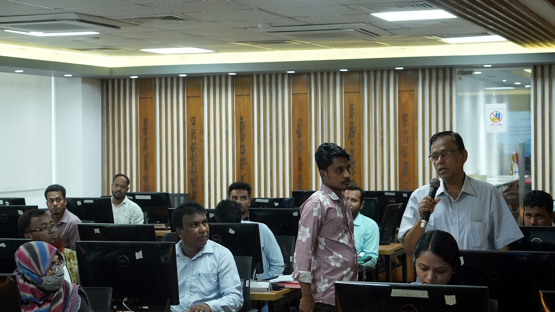 Participant asking a question during the opening session