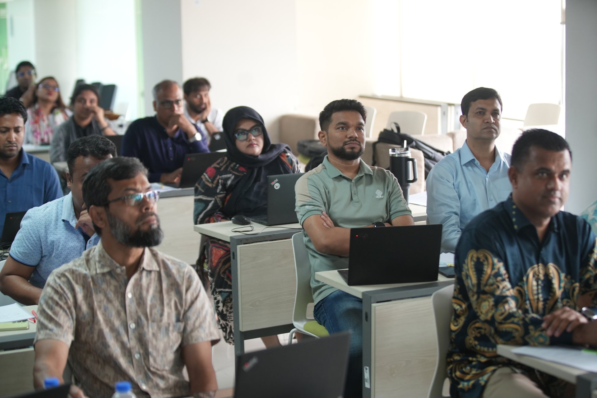 Wide view of the participants in the a2i Meeting Room