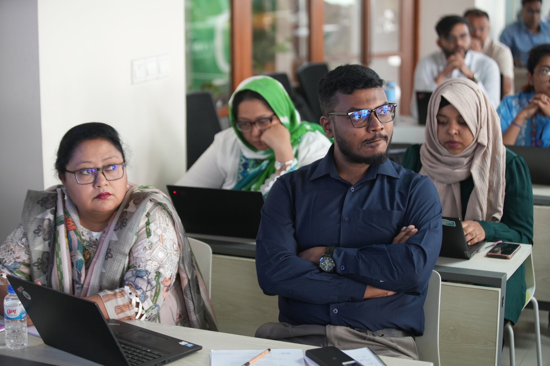 Participants discussing PMP concepts