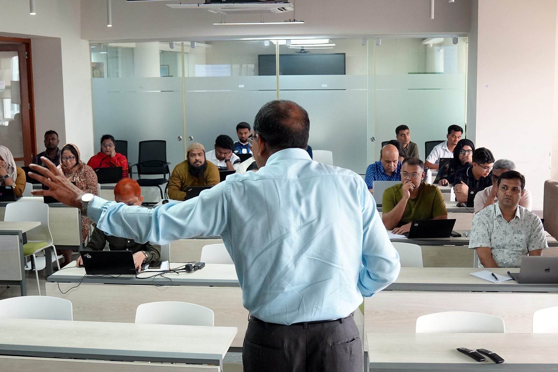 Trainer addressing the cohort from the front