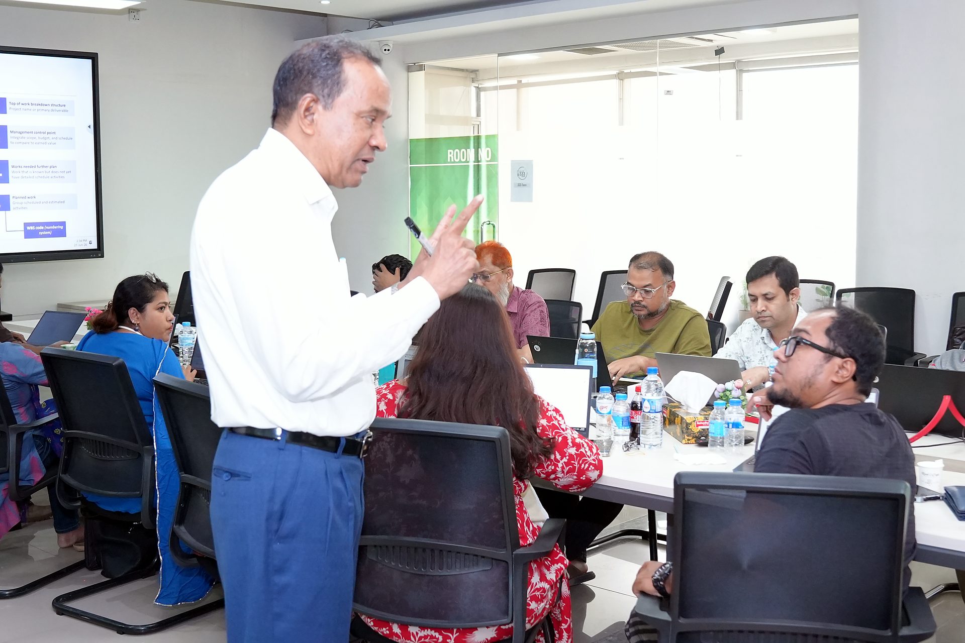 Trainer addressing a working group