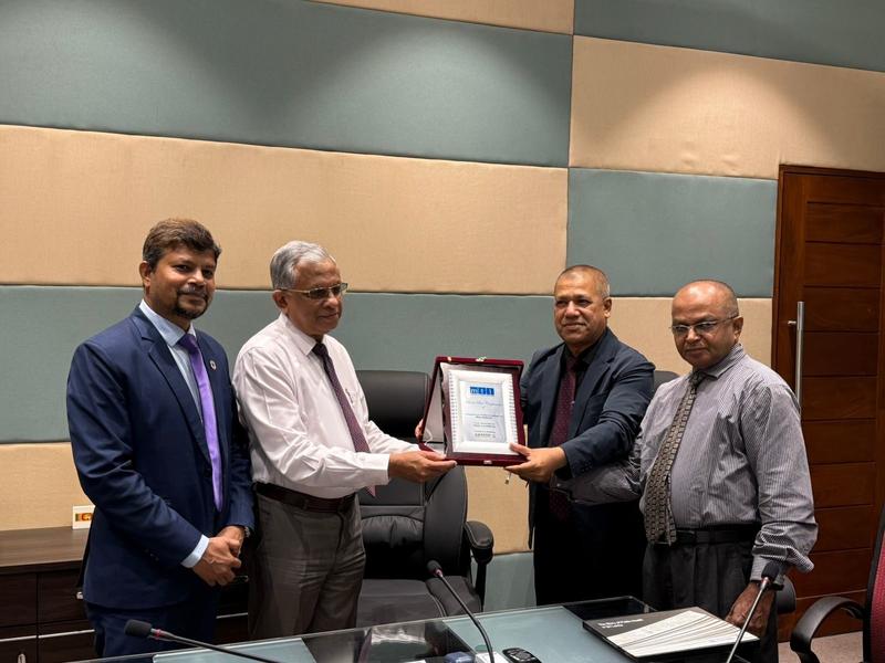 Crest presentation to the Director General of Health Services